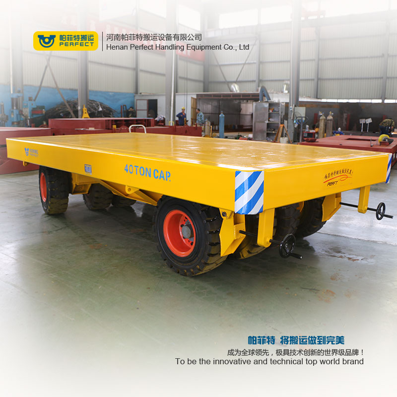 transfer flat trailers towed by tractor , material handing equipment manufacturer